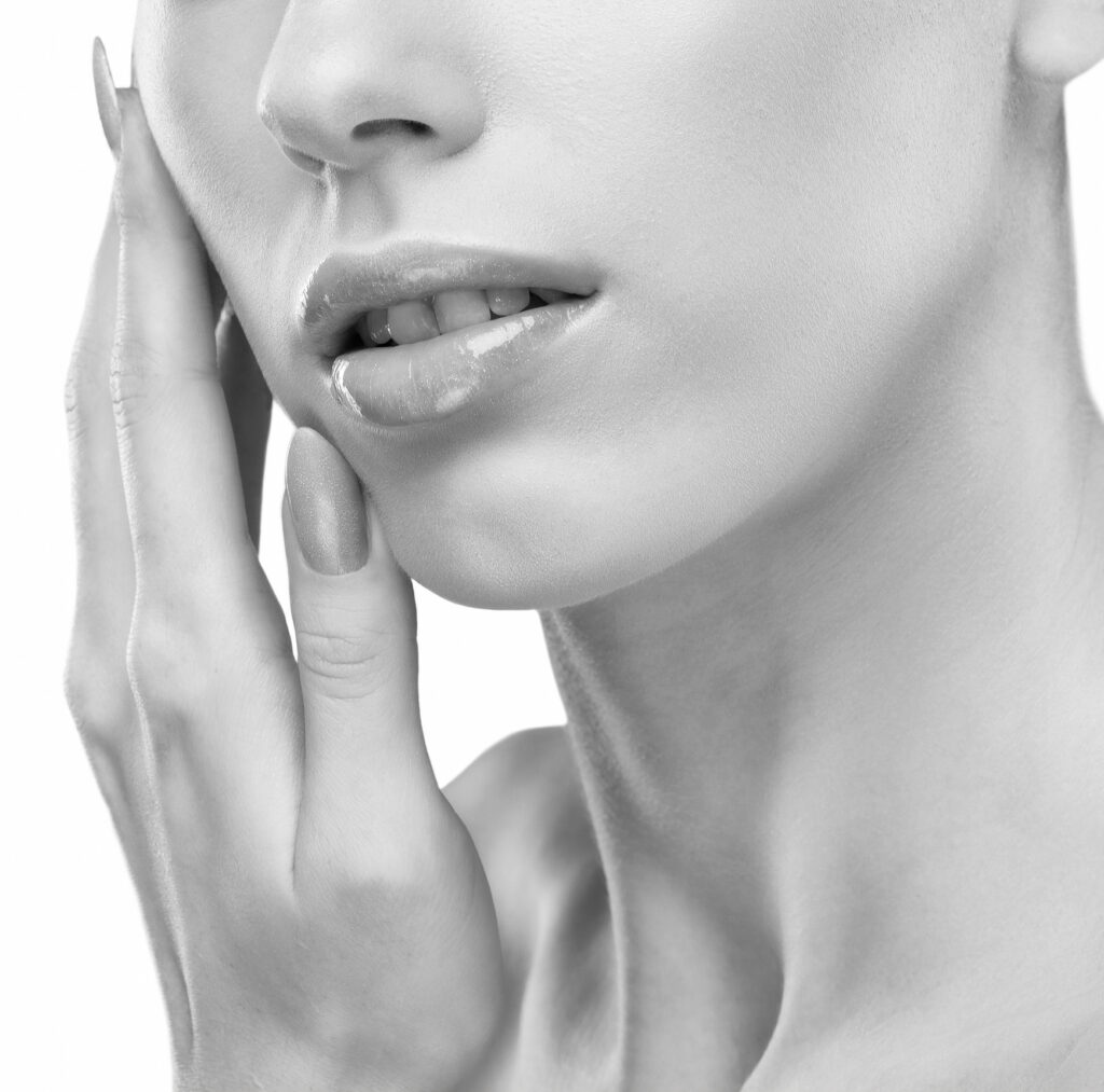 attractive girl with healthy clean skin. Aesthetic cosmetology and makeup concept.